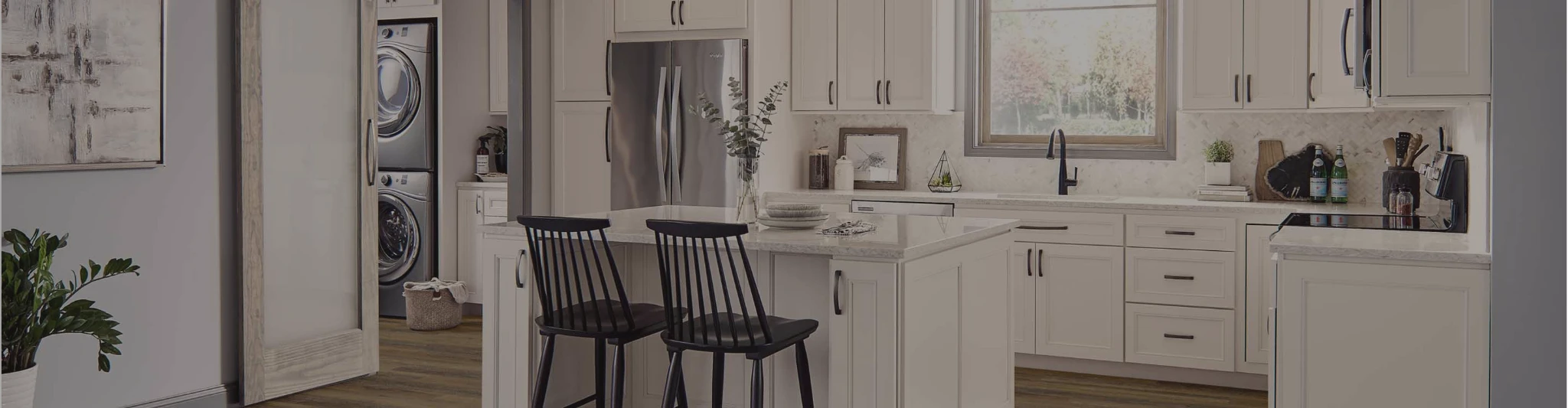 white cabinetry in a kitchen with wood-look flooring