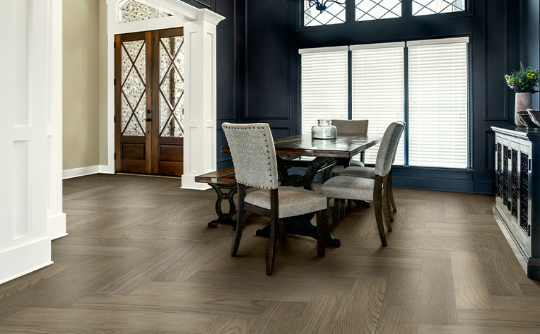 herringbone hardwood flooring in contemporary dining room